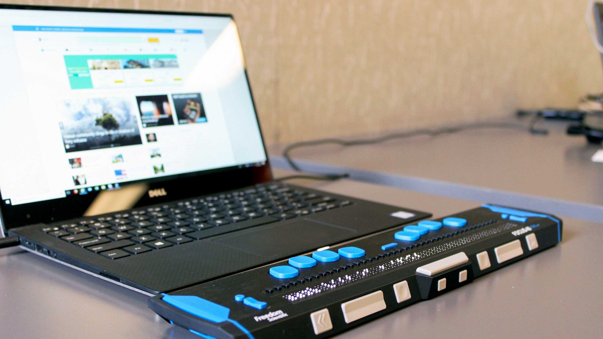 A computer with a refreshable braille display.