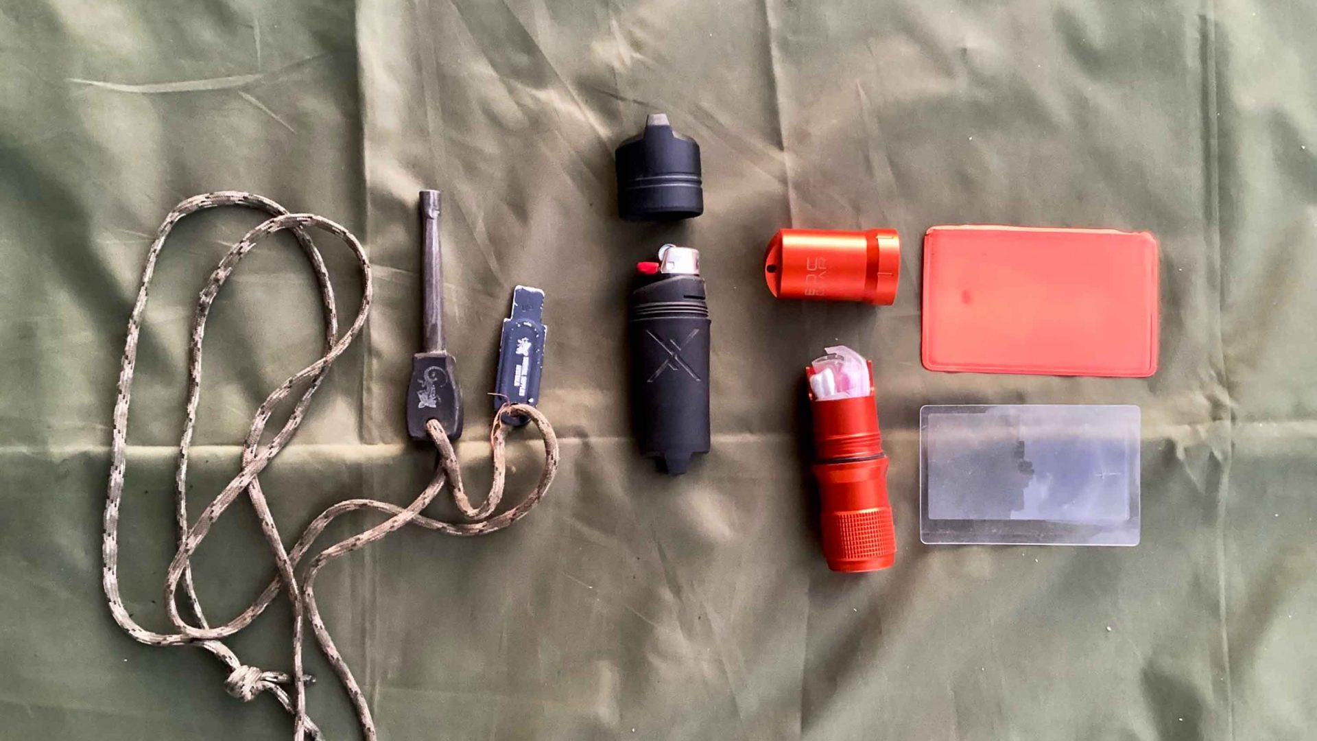 A combustion device on a green piece of fabric.